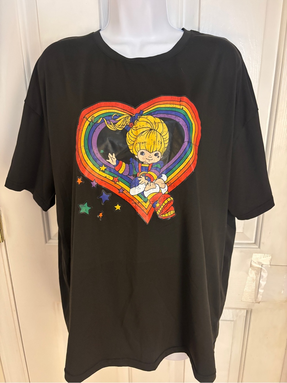 Source Unknown Black Tee with Rainbow Heart Character